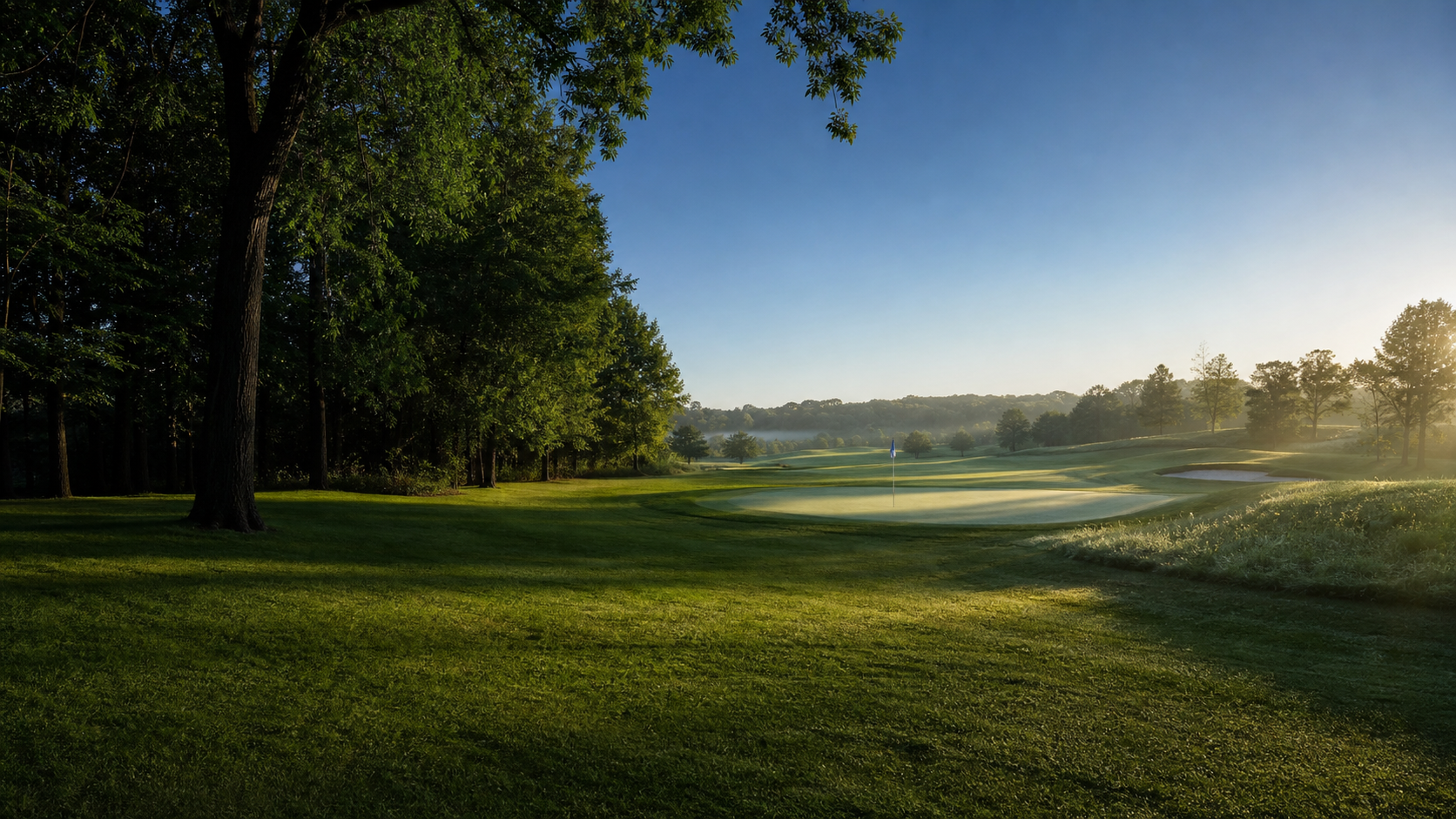 Morning light across a golf course green